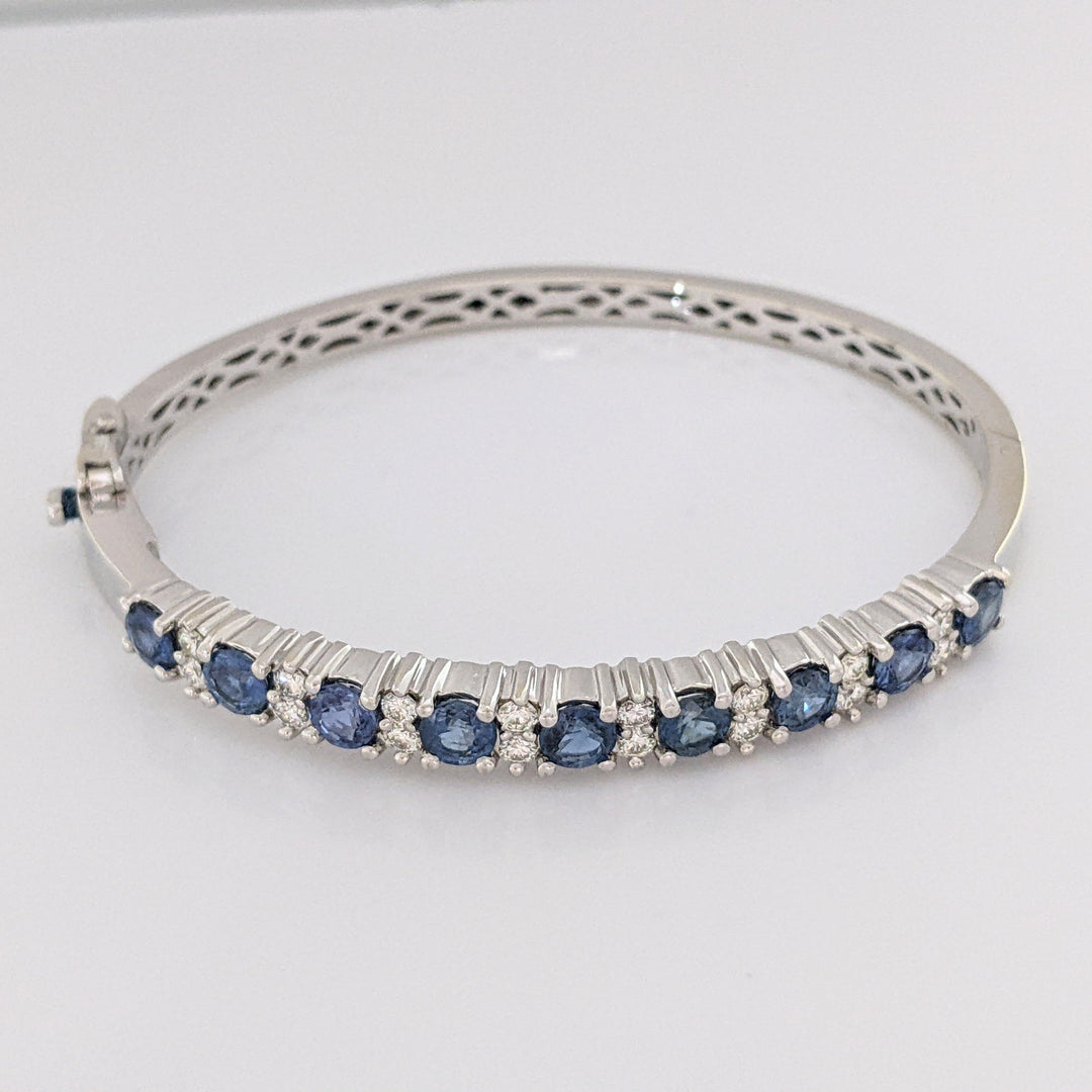 14K SAPPHIRE 4.50 CARAT TOTAL WEIGHT (9) ROUND WITH .71 DIAMOND TOTAL WEIGHT ESTATE BANGLE 23.9 GRAMS
