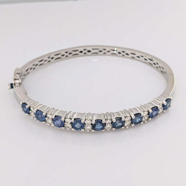14K SAPPHIRE 4.50 CARAT TOTAL WEIGHT (9) ROUND WITH .71 DIAMOND TOTAL WEIGHT ESTATE BANGLE 23.9 GRAMS