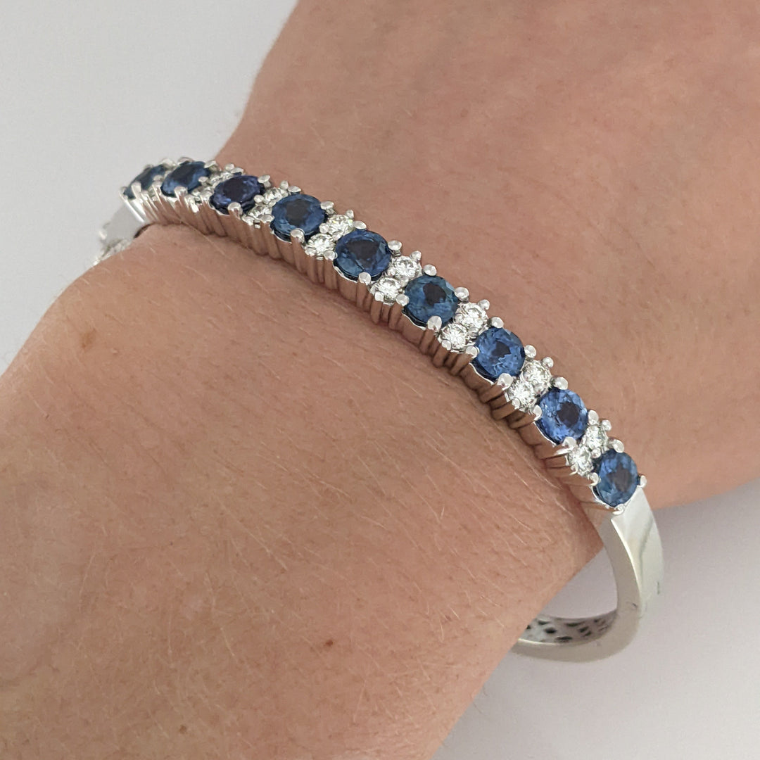 14K SAPPHIRE 4.50 CARAT TOTAL WEIGHT (9) ROUND WITH .71 DIAMOND TOTAL WEIGHT ESTATE BANGLE 23.9 GRAMS
