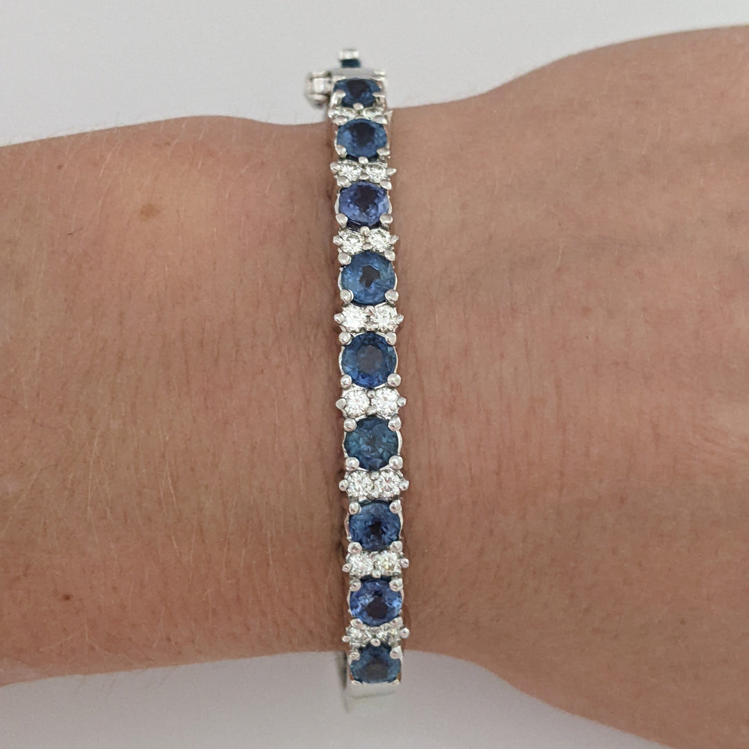 14K SAPPHIRE 4.50 CARAT TOTAL WEIGHT (9) ROUND WITH .71 DIAMOND TOTAL WEIGHT ESTATE BANGLE 23.9 GRAMS