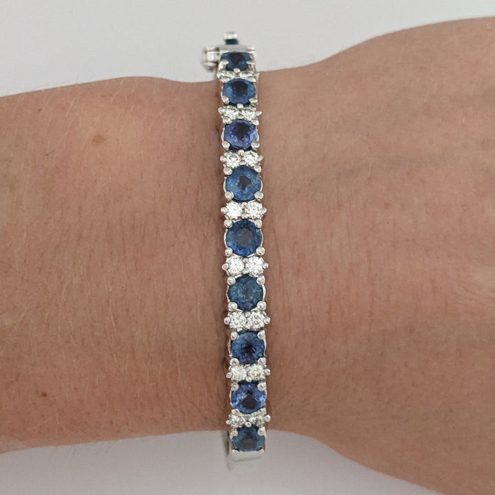 14K SAPPHIRE 4.50 CARAT TOTAL WEIGHT (9) ROUND WITH .71 DIAMOND TOTAL WEIGHT ESTATE BANGLE 23.9 GRAMS