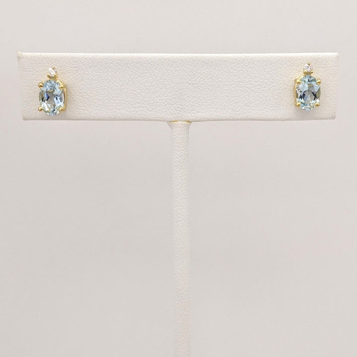 14K AQUAMARINE OVAL 5X7 WITH MELEE ESTATE EARRINGS 1.3 GRAMS