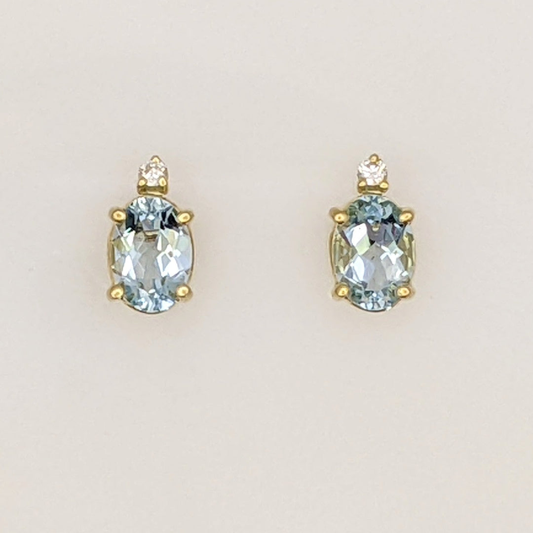 14K AQUAMARINE OVAL 5X7 WITH MELEE ESTATE EARRINGS 1.3 GRAMS
