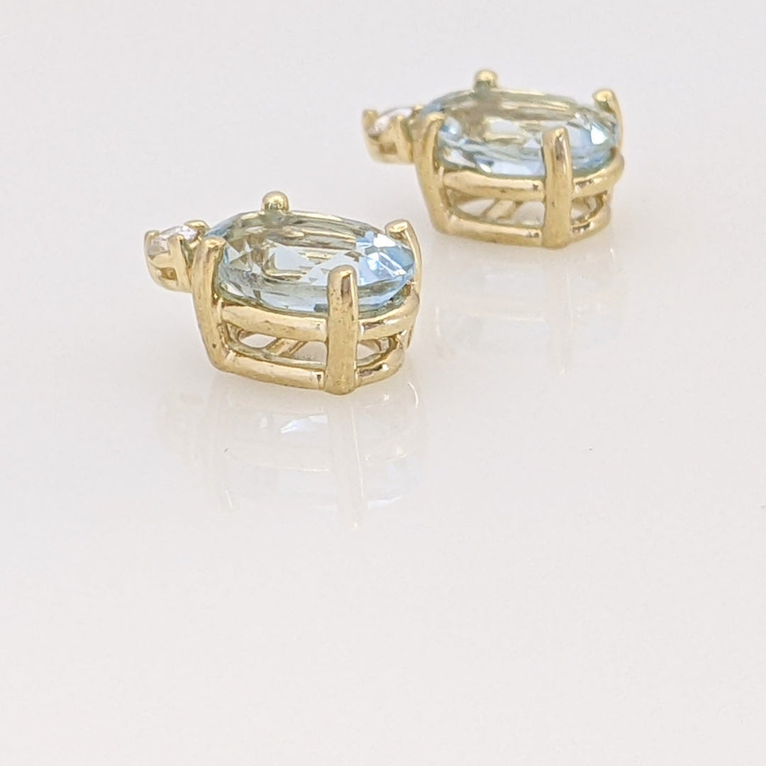 14K AQUAMARINE OVAL 5X7 WITH MELEE ESTATE EARRINGS 1.3 GRAMS
