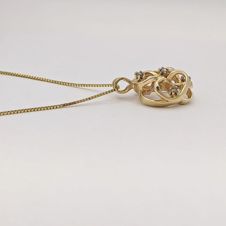 14K .27 CARAT TOTAL WEIGHT I1 L DIAMOND ROUND (6) OPEN FREE FORM ESTATE PENDANT & CHAIN 6.5 GRAMS