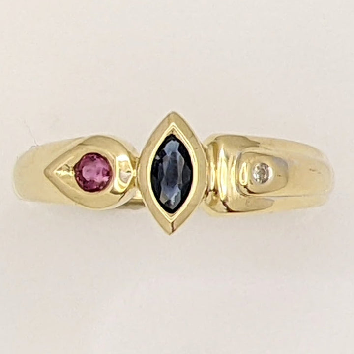 14K TWO-TONE SAPPHIRE MARQUISE 2.5X5 (1) RUBY ROUND 2.4MM (1) WITH MELEE ESTATE RING 2.2 GRAMS