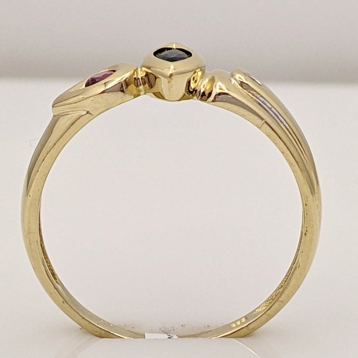 14K TWO-TONE SAPPHIRE MARQUISE 2.5X5 (1) RUBY ROUND 2.4MM (1) WITH MELEE ESTATE RING 2.2 GRAMS