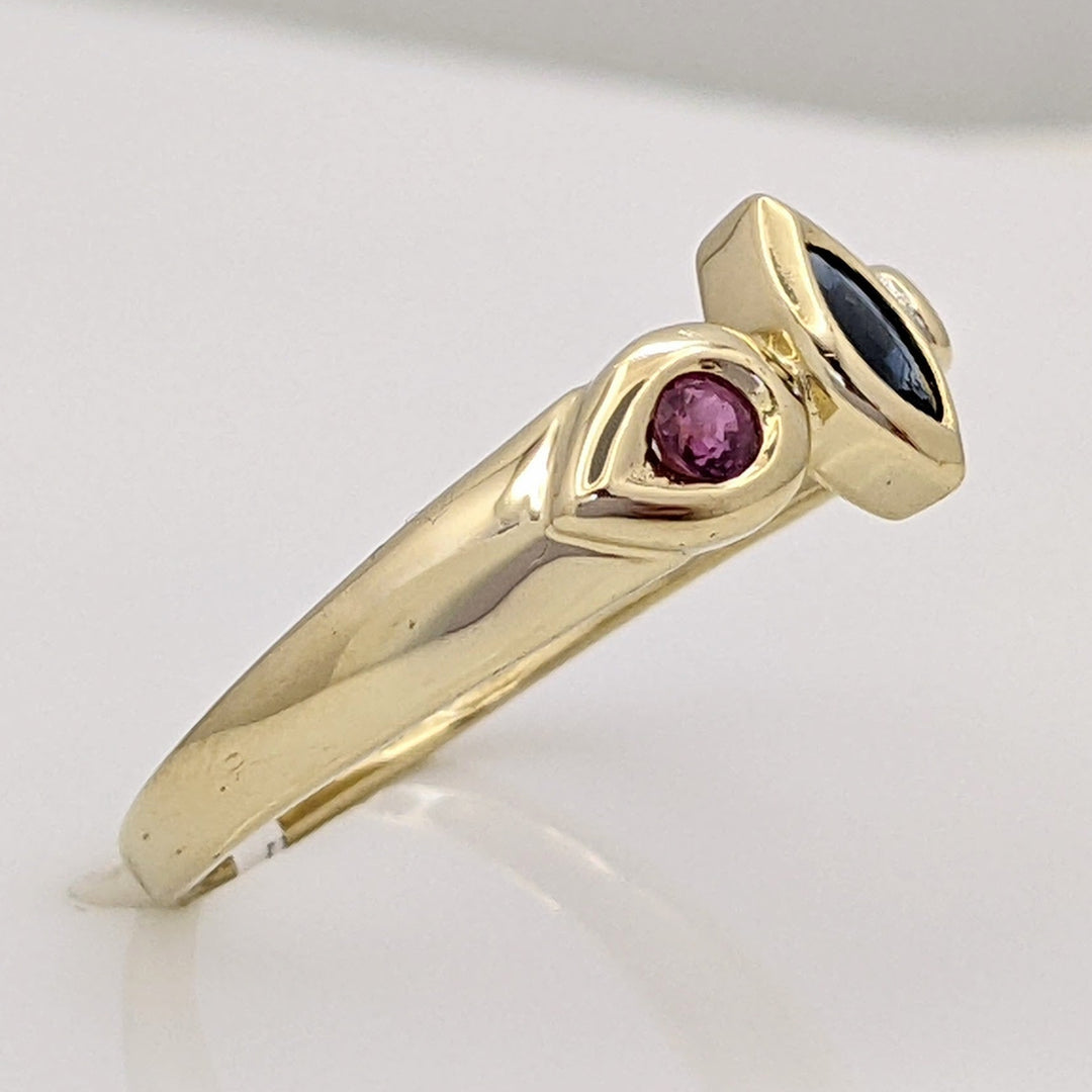 14K TWO-TONE SAPPHIRE MARQUISE 2.5X5 (1) RUBY ROUND 2.4MM (1) WITH MELEE ESTATE RING 2.2 GRAMS