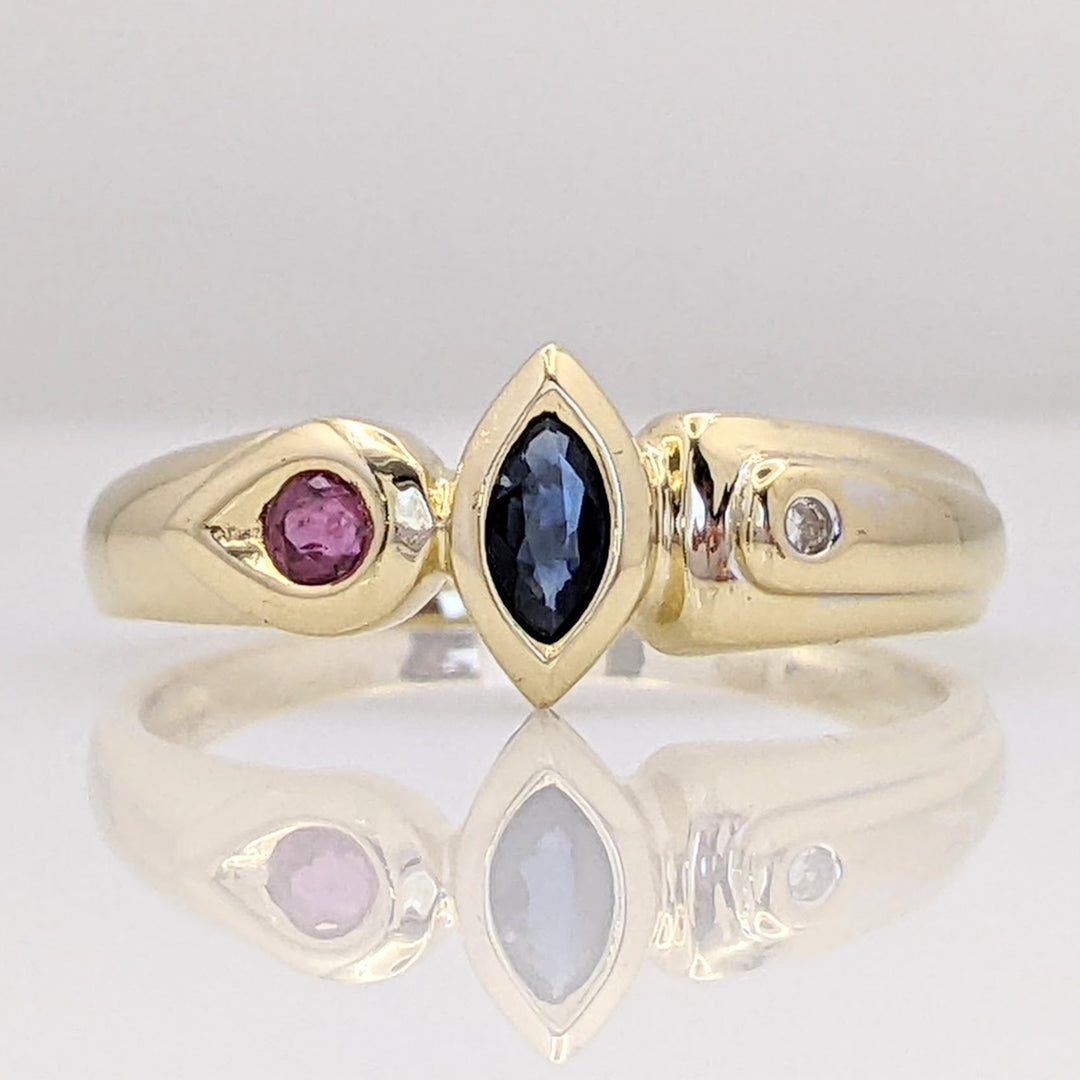 14K TWO-TONE SAPPHIRE MARQUISE 2.5X5 (1) RUBY ROUND 2.4MM (1) WITH MELEE ESTATE RING 2.2 GRAMS