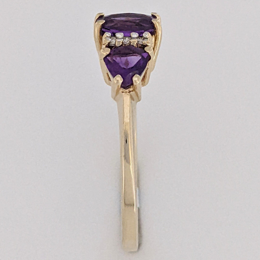 10K AMETHYST OVAL 4X6 WITH (2) TRILLION 4MM WITH (6) MELEE ESTATE RING 1.9 GRAMS