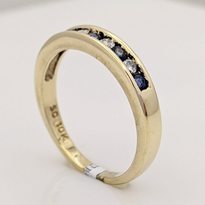 10K SAPPHIRE ROUND (5) WITH (4) MELEE CHANNEL SET ESTATE BAND 2.9 GRAMS