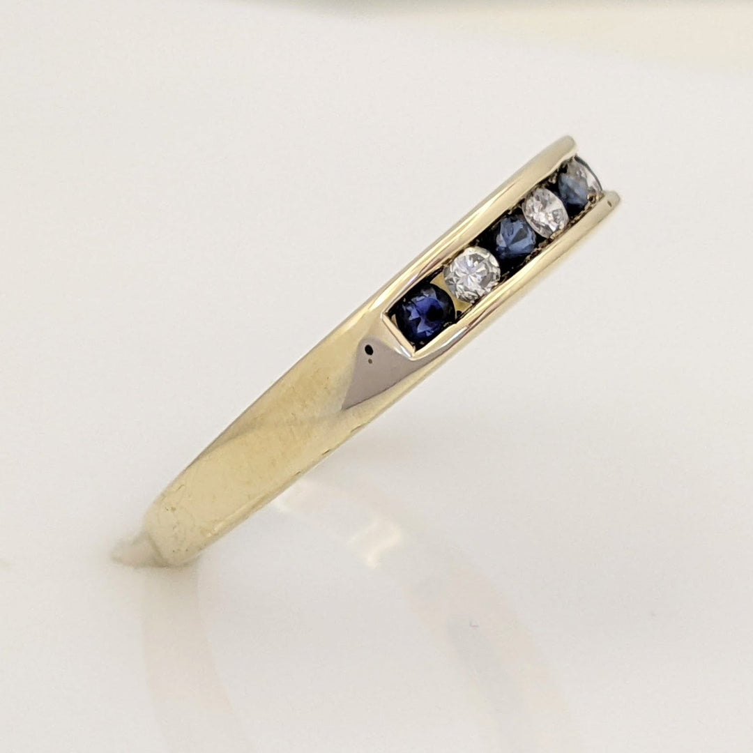 10K SAPPHIRE ROUND (5) WITH (4) MELEE CHANNEL SET ESTATE BAND 2.9 GRAMS