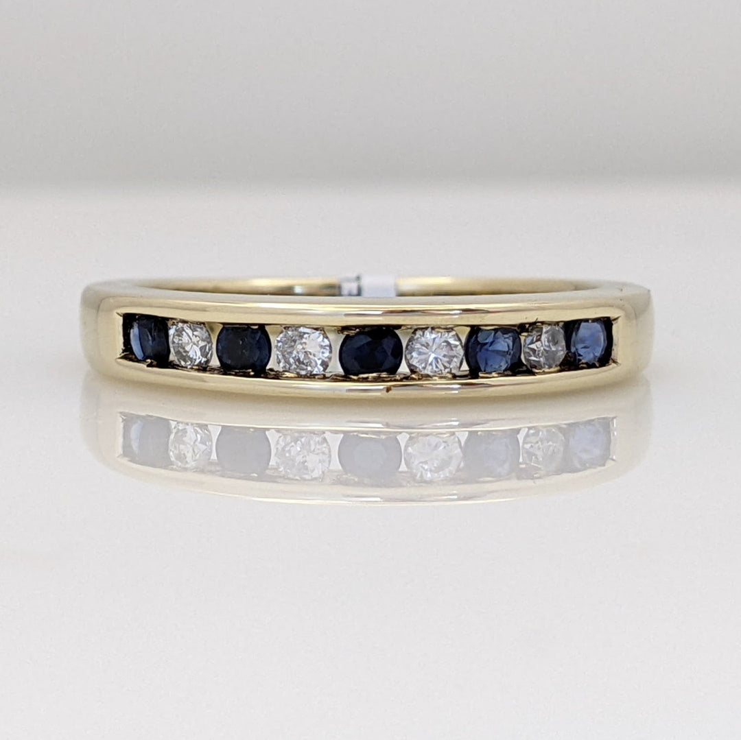 10K SAPPHIRE ROUND (5) WITH (4) MELEE CHANNEL SET ESTATE BAND 2.9 GRAMS