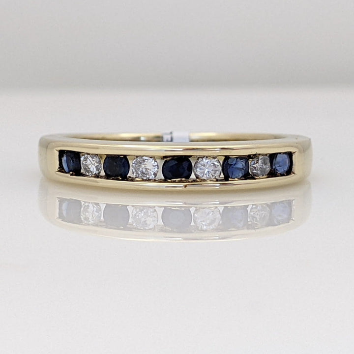 10K SAPPHIRE ROUND (5) WITH (4) MELEE CHANNEL SET ESTATE BAND 2.9 GRAMS