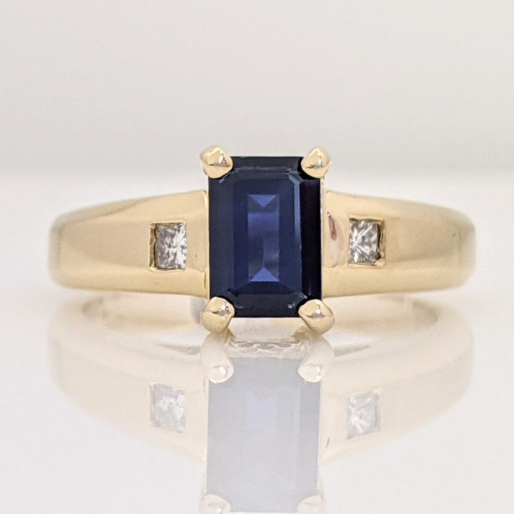 14K SAPPHIRE EMERALD CUT 5X7 WITH .18 DIAMOND TOTAL WEIGHT (2) PRINCESS CUT ESTATE RING 4.7 GRAMS