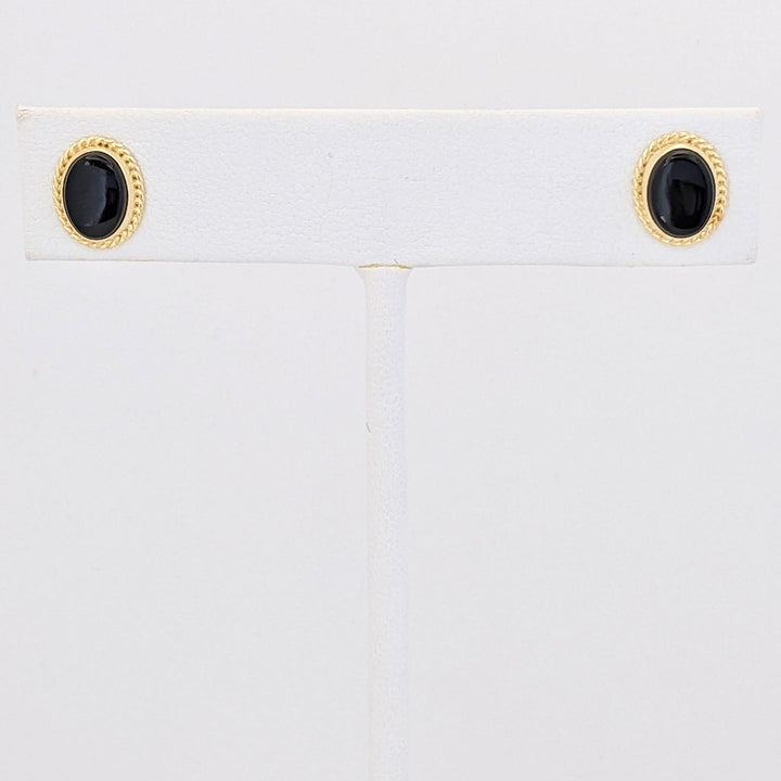 14K ONYX OVAL 5.5X8MM WITH GOLD TRIM ESTATE EARRINGS 1.2 GRAMS