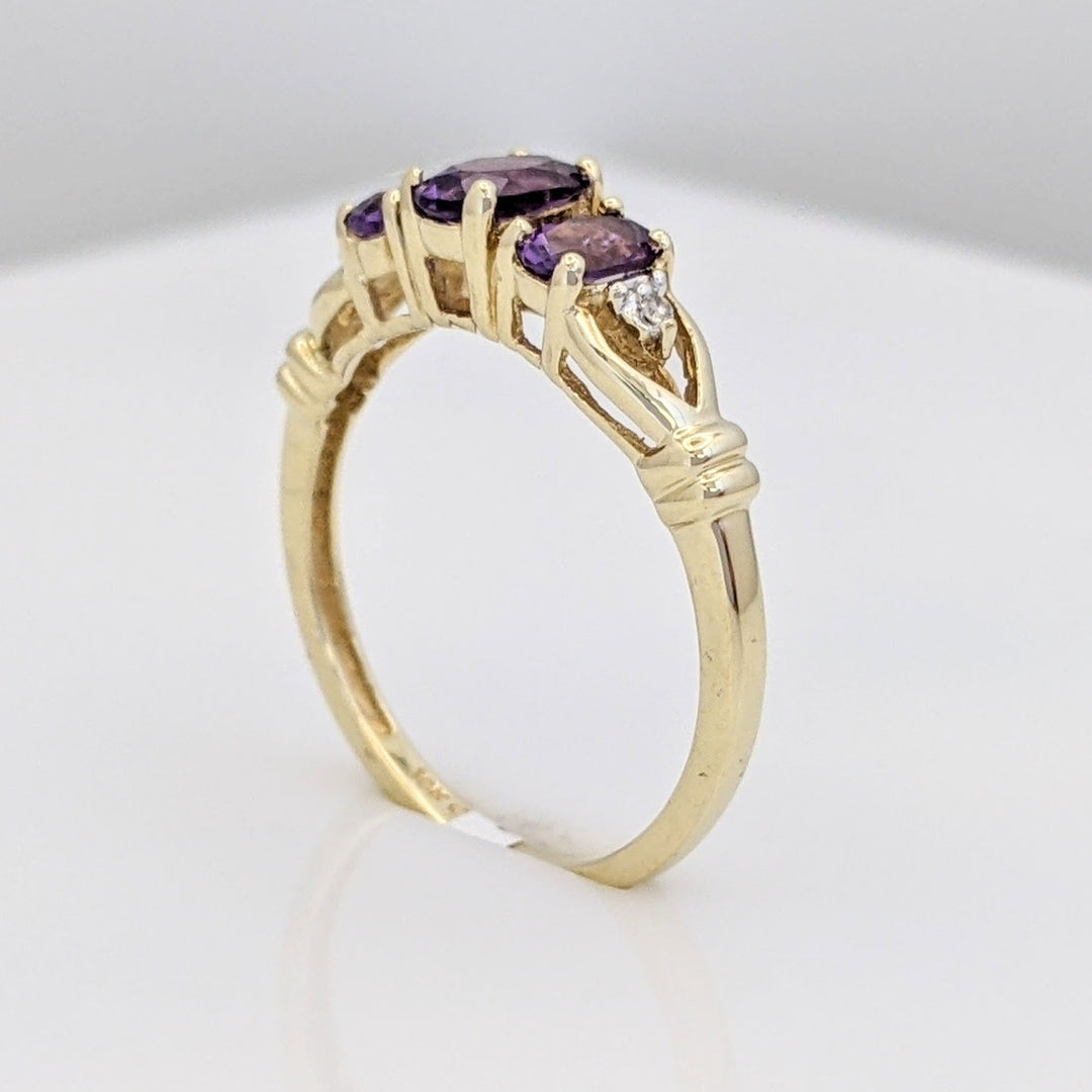 10K AMETHYST OVAL (3) WITH (2) MELEE ESTATE RING 2.0 GRAMS