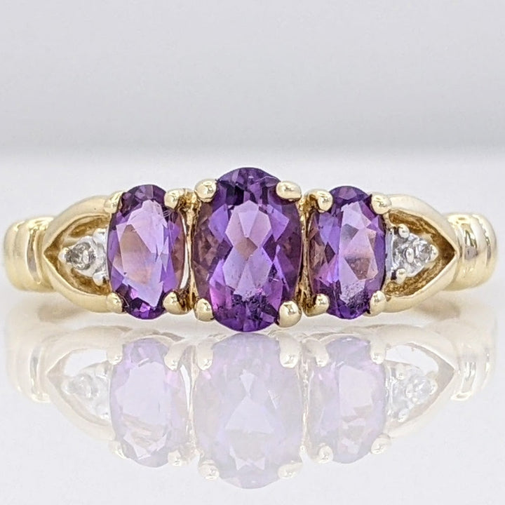 10K AMETHYST OVAL (3) WITH (2) MELEE ESTATE RING 2.0 GRAMS