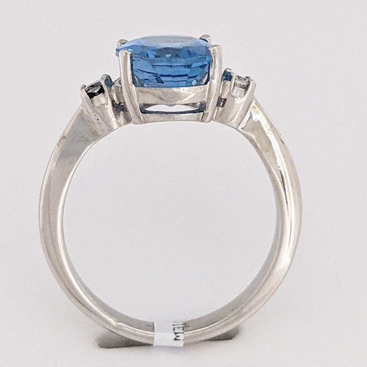 18K WHITE LONDON BLUE TOPAZ OVAL 8X10 WITH (2) MELEE ESTATE RING 4.4 GRAMS