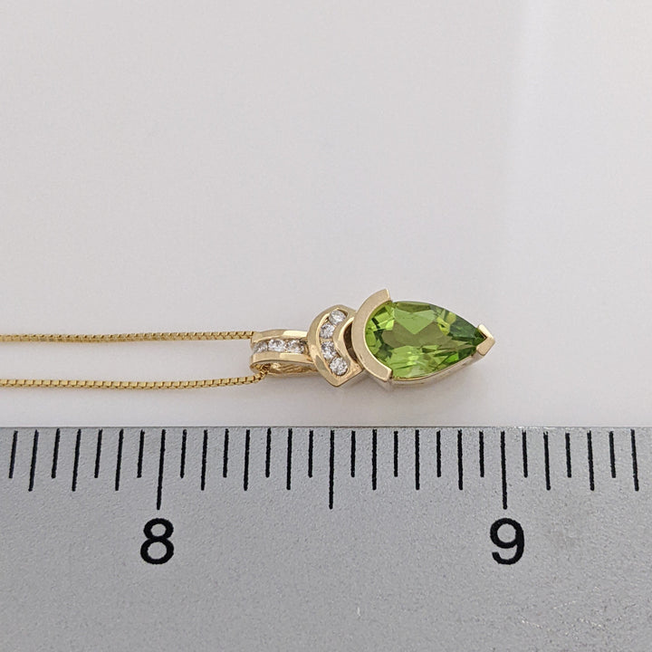 14K PERIDOT PEAR 6X8 WITH (7) MELEE ESTATE PENDANT &amp; CHAIN 2.9 GRAMS