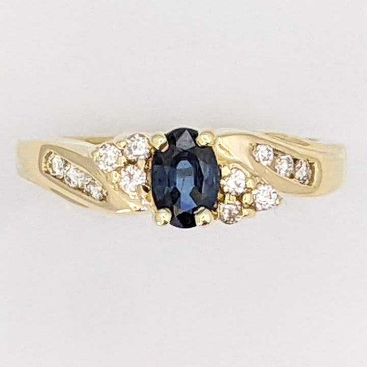 14K SAPPHIRE OVAL 4X6 WITH .18 DIAMOND TOTAL WEIGHT (12) ROUND ESTATE RING 5.0 GRAMS