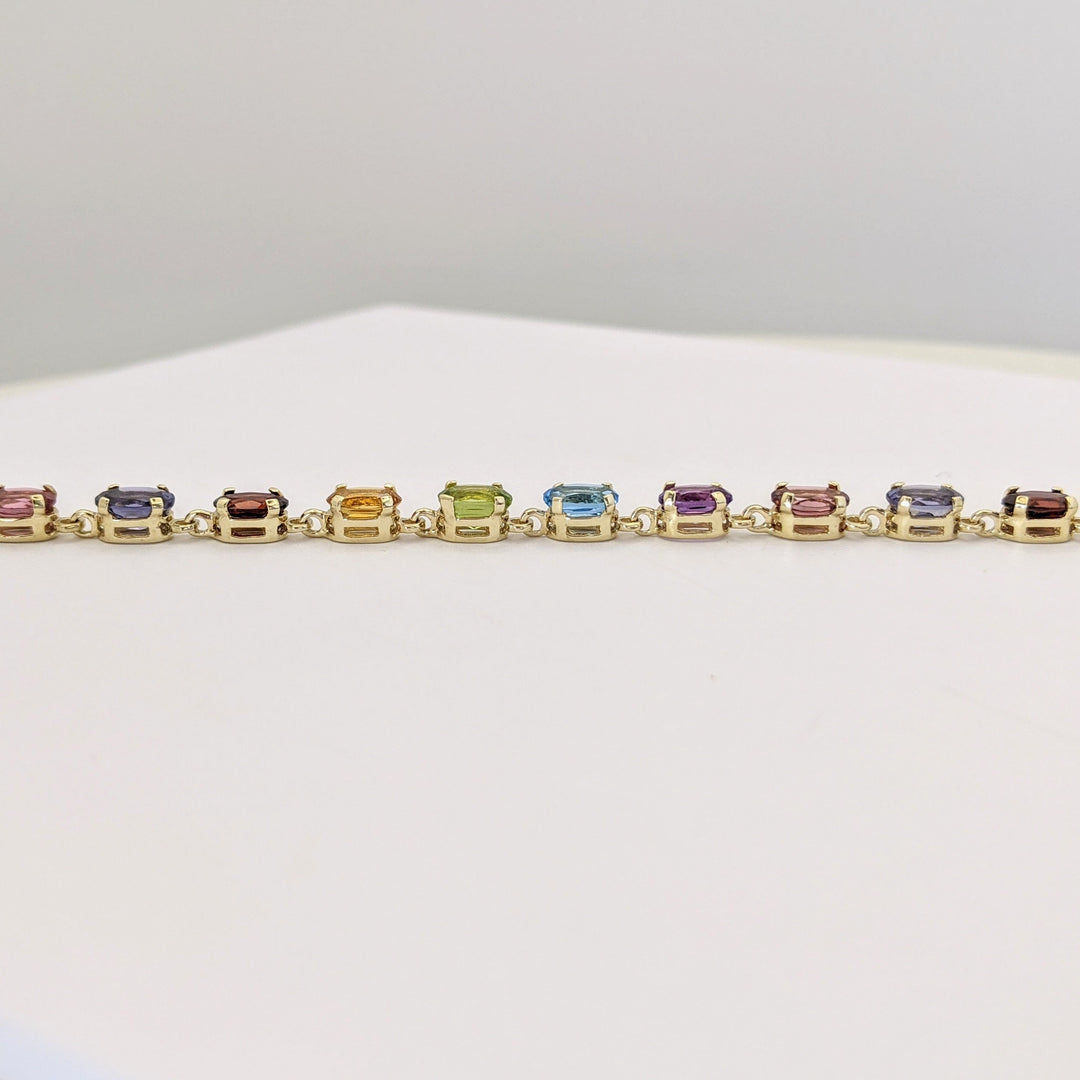 14K IOLITE, TOURMALINE, AMETHYST, BLUE TOPAZ, PERIDOT, CITRINE, GARNET OVAL 4X6 ESTATE BRACELET 6.7 GRAMS