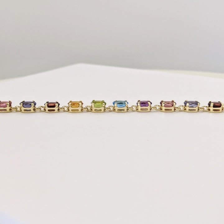 14K IOLITE, TOURMALINE, AMETHYST, BLUE TOPAZ, PERIDOT, CITRINE, GARNET OVAL 4X6 ESTATE BRACELET 6.7 GRAMS