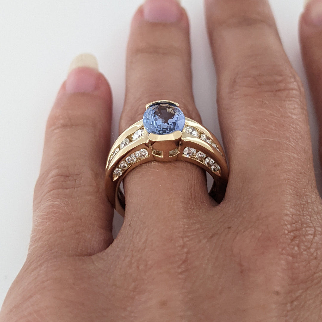 14K SAPPHIRE OVAL 7X9 WITH .59 DIAMOND TOTAL WEIGHT (24) ROUND ESTATE RING 8.1 GRAMS