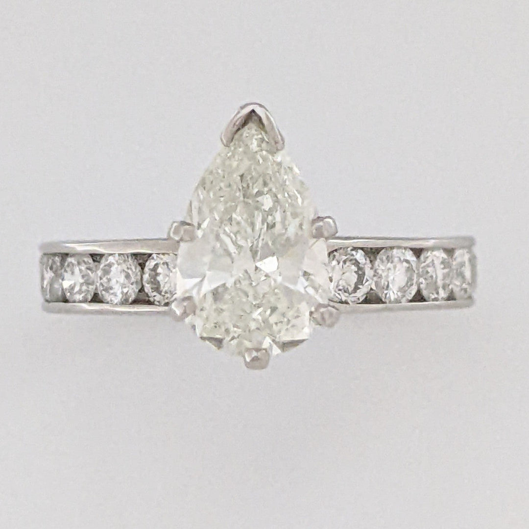 14K WHITE 2.39 CARAT TOTAL WEIGHT I1 K DIAMOND PEAR WITH (10) ROUND CHANNEL DIAMOND ESTATE RING 4.1 GRAMS
