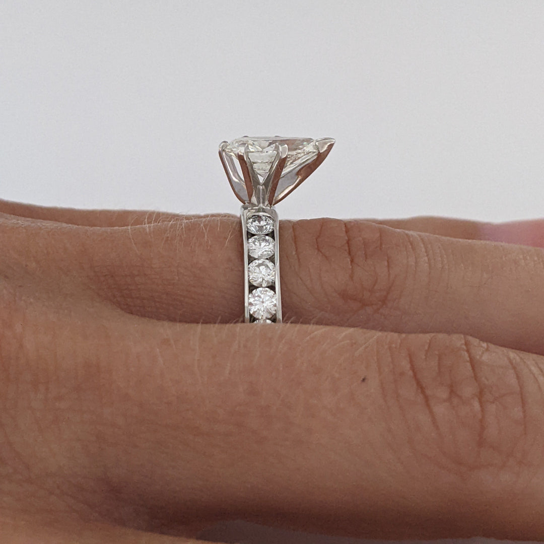 14K WHITE 2.39 CARAT TOTAL WEIGHT I1 K DIAMOND PEAR WITH (10) ROUND CHANNEL DIAMOND ESTATE RING 4.1 GRAMS