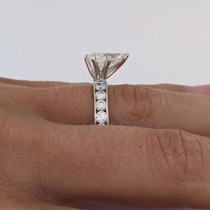 14K WHITE 2.39 CARAT TOTAL WEIGHT I1 K DIAMOND PEAR WITH (10) ROUND CHANNEL DIAMOND ESTATE RING 4.1 GRAMS