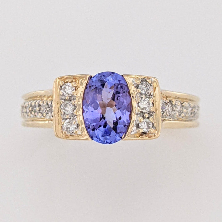 14K TANZANITE OVAL 5X7 WITH .20 DIAMOND TOTAL WEIGHT (20) ROUND ESTATE RING 4.8 GRAMS