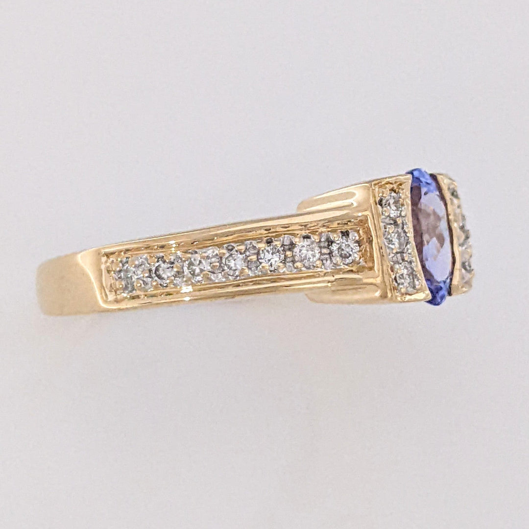 14K TANZANITE OVAL 5X7 WITH .20 DIAMOND TOTAL WEIGHT (20) ROUND ESTATE RING 4.8 GRAMS
