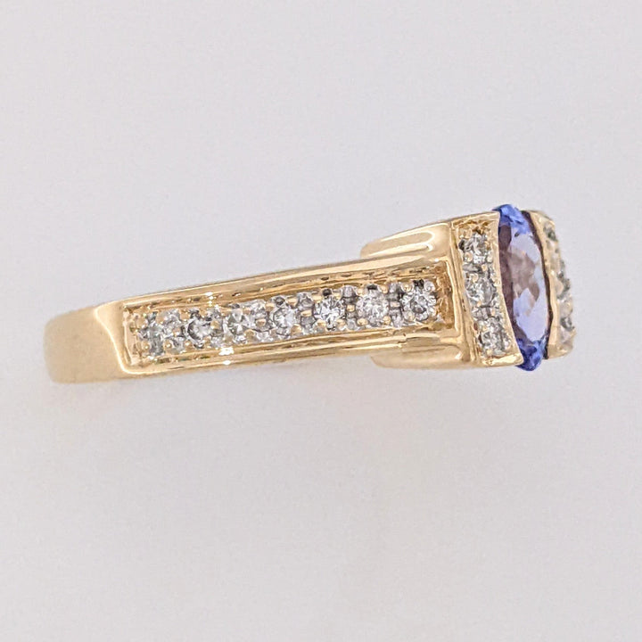 14K TANZANITE OVAL 5X7 WITH .20 DIAMOND TOTAL WEIGHT (20) ROUND ESTATE RING 4.8 GRAMS
