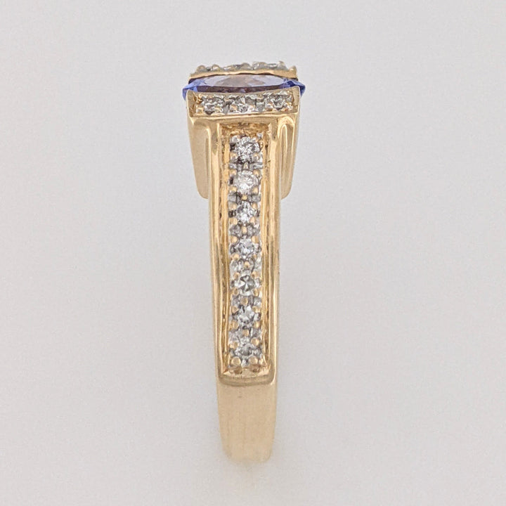 14K TANZANITE OVAL 5X7 WITH .20 DIAMOND TOTAL WEIGHT (20) ROUND ESTATE RING 4.8 GRAMS