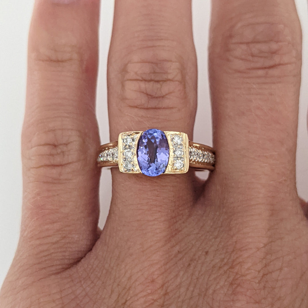 14K TANZANITE OVAL 5X7 WITH .20 DIAMOND TOTAL WEIGHT (20) ROUND ESTATE RING 4.8 GRAMS