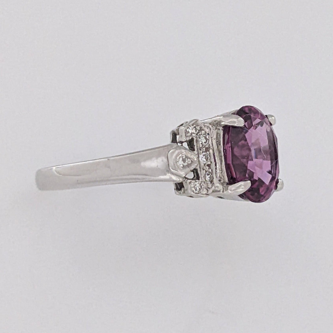 18K WHITE RHODOLITE GARNET OVAL 7X8.5 WITH .06 DIAMOND TOTAL WEIGHT ESTATE RING 3.8 GRAMS