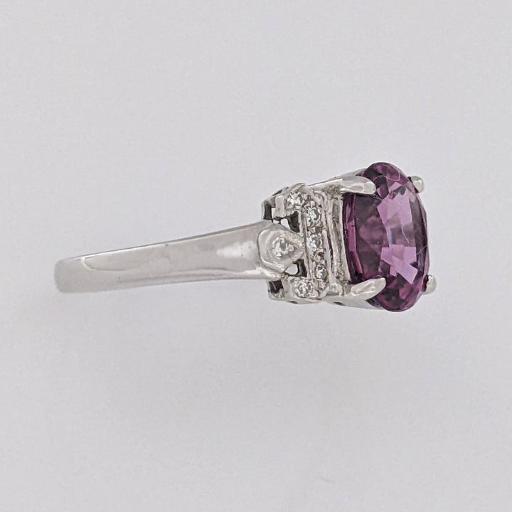 18K WHITE RHODOLITE GARNET OVAL 7X8.5 WITH .06 DIAMOND TOTAL WEIGHT ESTATE RING 3.8 GRAMS