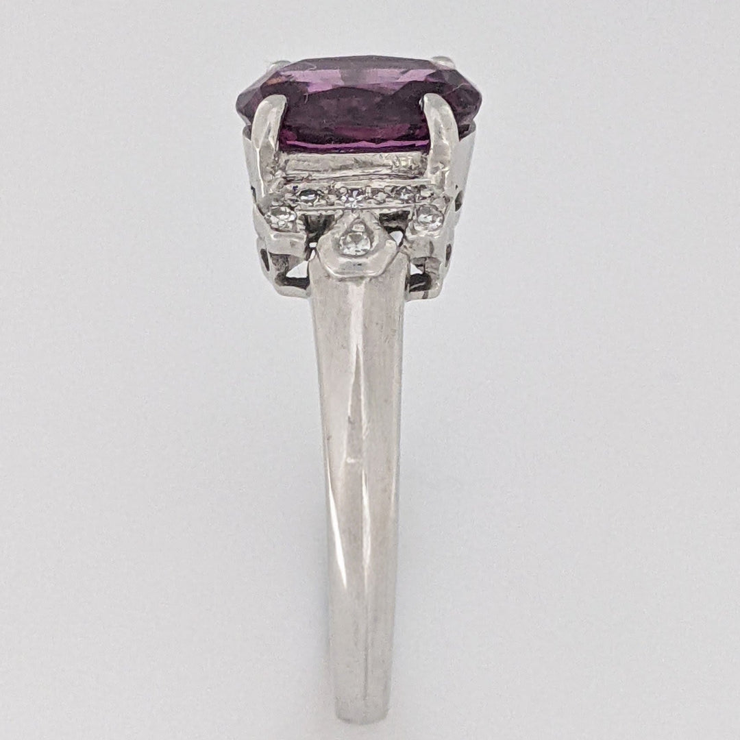 18K WHITE RHODOLITE GARNET OVAL 7X8.5 WITH .06 DIAMOND TOTAL WEIGHT ESTATE RING 3.8 GRAMS