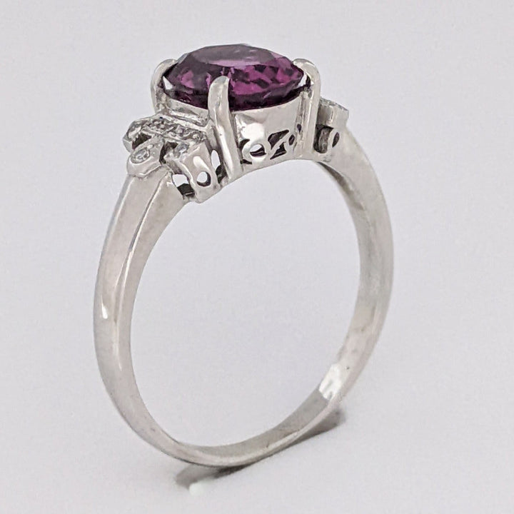18K WHITE RHODOLITE GARNET OVAL 7X8.5 WITH .06 DIAMOND TOTAL WEIGHT ESTATE RING 3.8 GRAMS