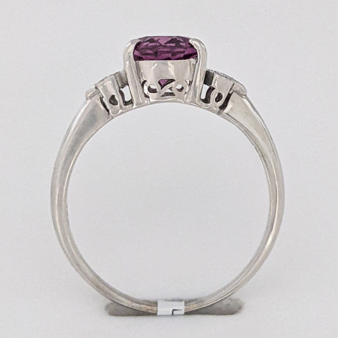 18K WHITE RHODOLITE GARNET OVAL 7X8.5 WITH .06 DIAMOND TOTAL WEIGHT ESTATE RING 3.8 GRAMS