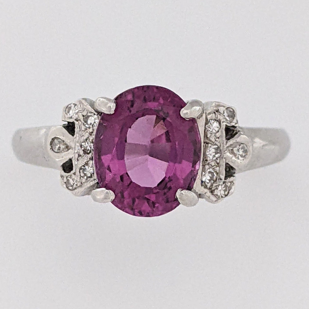 18K WHITE RHODOLITE GARNET OVAL 7X8.5 WITH .06 DIAMOND TOTAL WEIGHT ESTATE RING 3.8 GRAMS