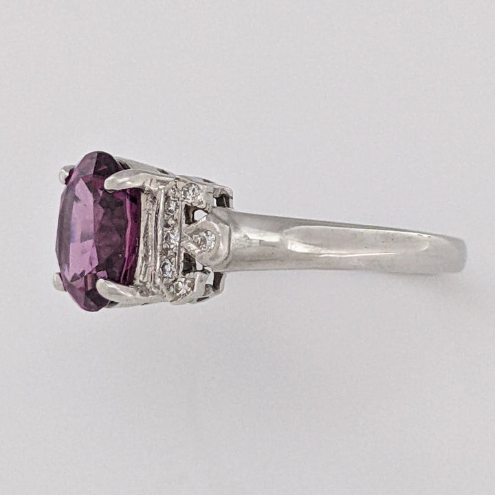 18K WHITE RHODOLITE GARNET OVAL 7X8.5 WITH .06 DIAMOND TOTAL WEIGHT ESTATE RING 3.8 GRAMS
