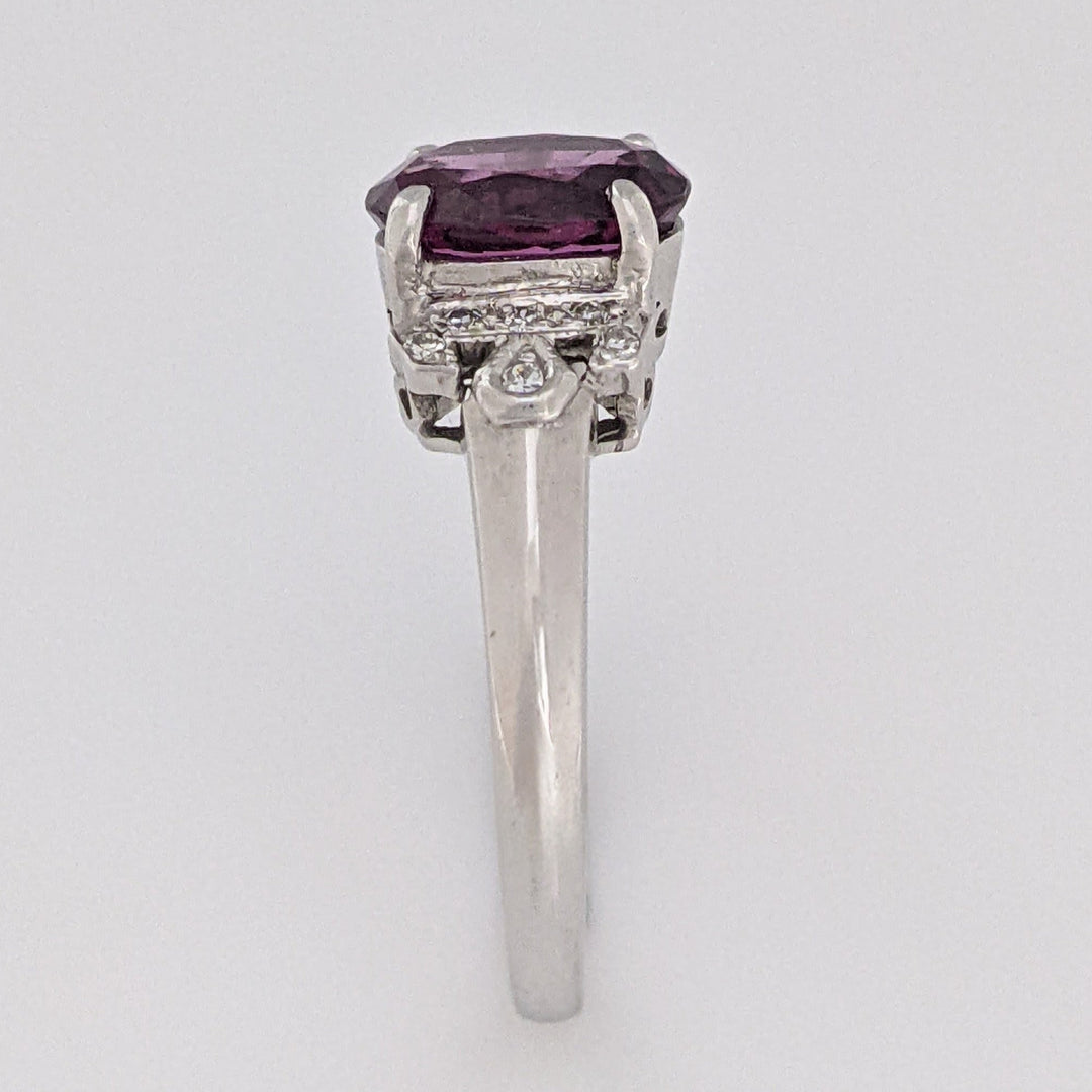 18K WHITE RHODOLITE GARNET OVAL 7X8.5 WITH .06 DIAMOND TOTAL WEIGHT ESTATE RING 3.8 GRAMS