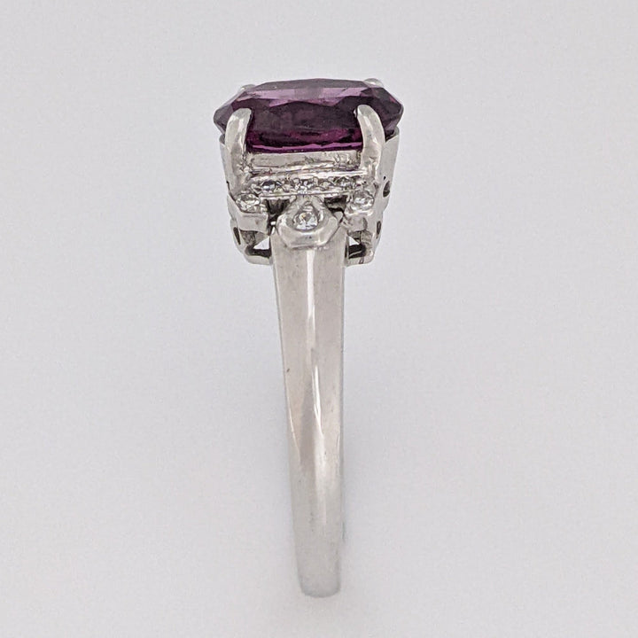 18K WHITE RHODOLITE GARNET OVAL 7X8.5 WITH .06 DIAMOND TOTAL WEIGHT ESTATE RING 3.8 GRAMS