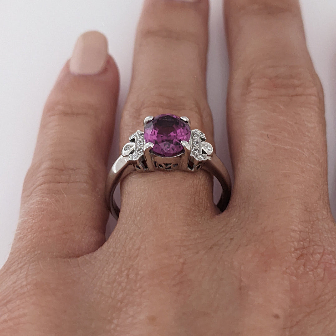 18K WHITE RHODOLITE GARNET OVAL 7X8.5 WITH .06 DIAMOND TOTAL WEIGHT ESTATE RING 3.8 GRAMS