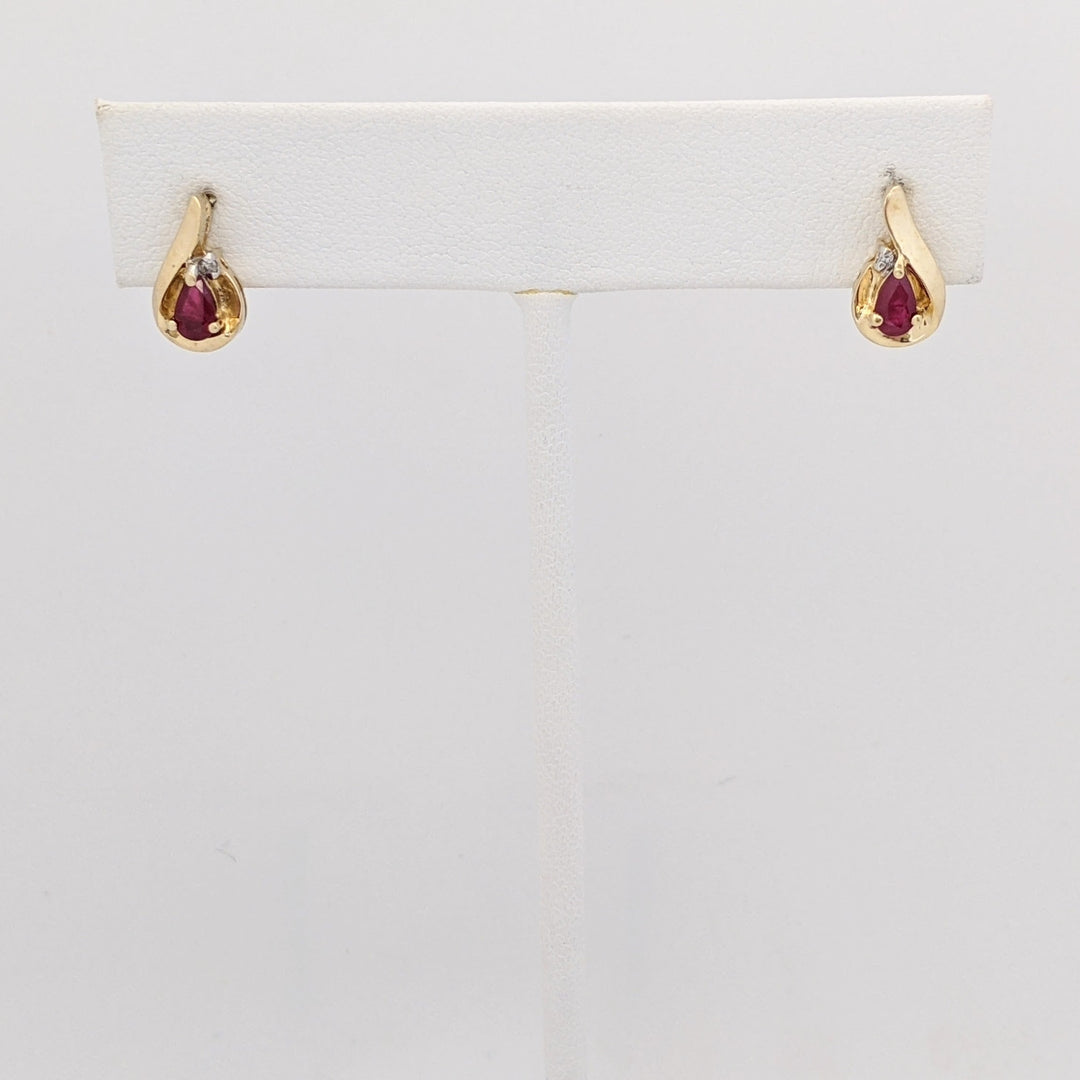 10K RUBY PEAR 3X5 WITH MELEE AND GOLD TRIM ESTATE EARRINGS 1.7 GRAMS