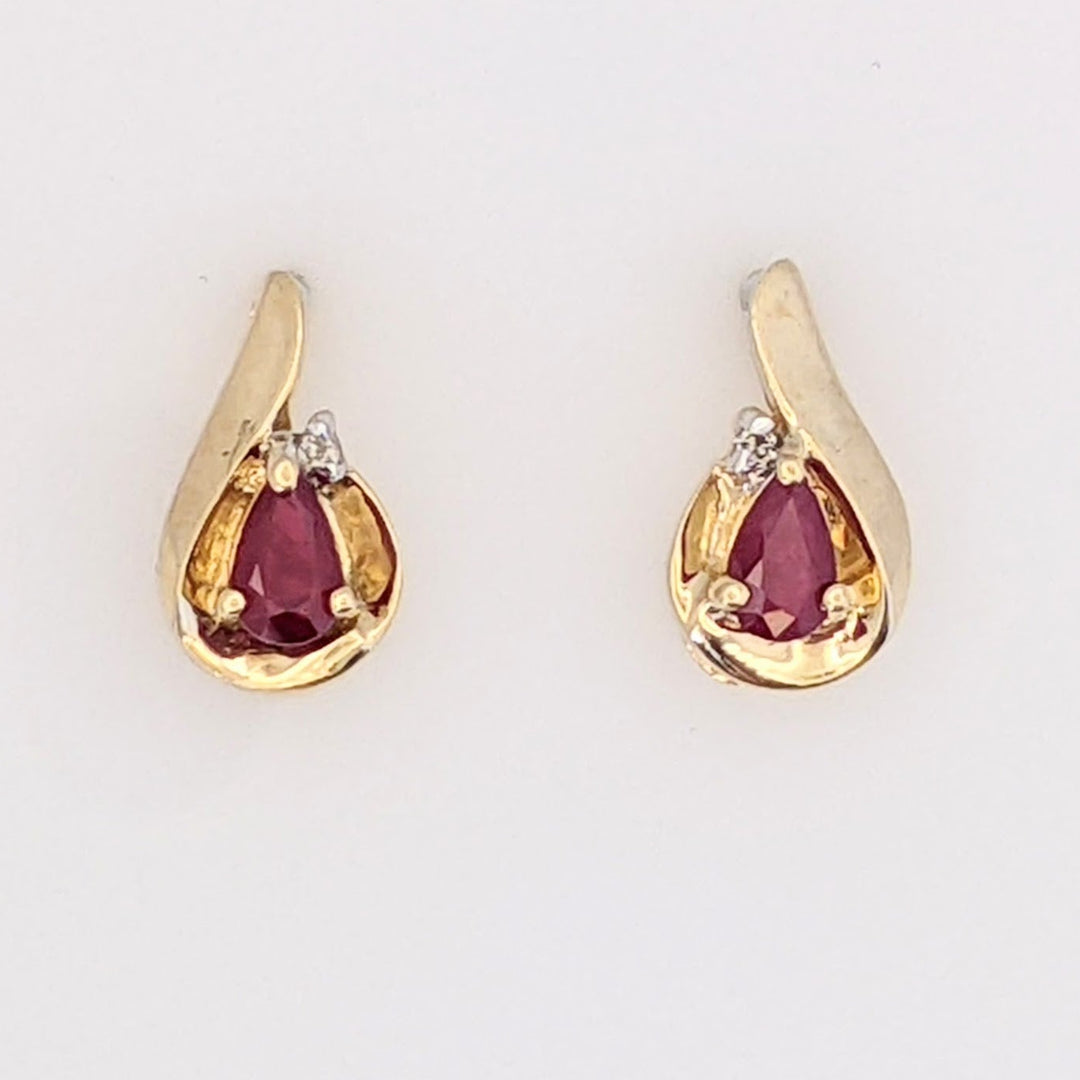 10K RUBY PEAR 3X5 WITH MELEE AND GOLD TRIM ESTATE EARRINGS 1.7 GRAMS