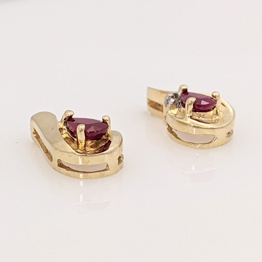 10K RUBY PEAR 3X5 WITH MELEE AND GOLD TRIM ESTATE EARRINGS 1.7 GRAMS