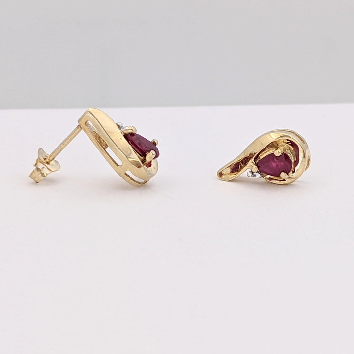10K RUBY PEAR 3X5 WITH MELEE AND GOLD TRIM ESTATE EARRINGS 1.7 GRAMS